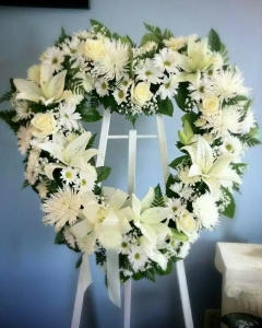 Heart-shaped easel spray with Lilies, Daisies…